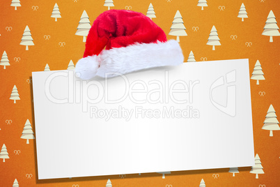 Composite image of santa hat on poster