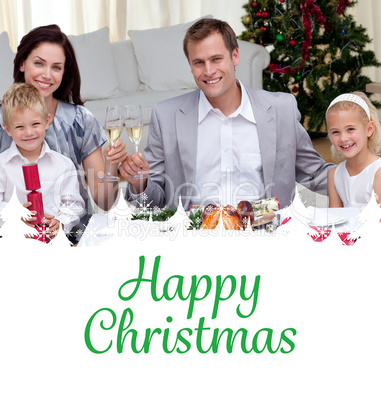 Composite image of parents toasting with wine in christmas dinne