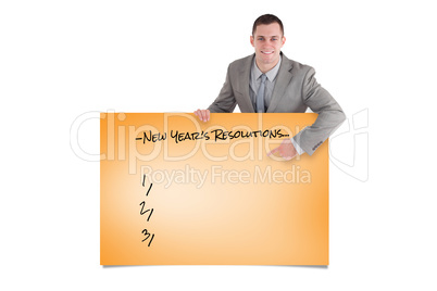 Composite image of portrait of a smiling entrepreneur pointing a