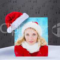 Composite image of happy festive blonde