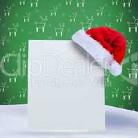 Composite image of santa hat on poster