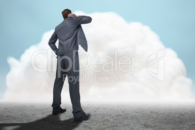 Composite image of thinking businessman