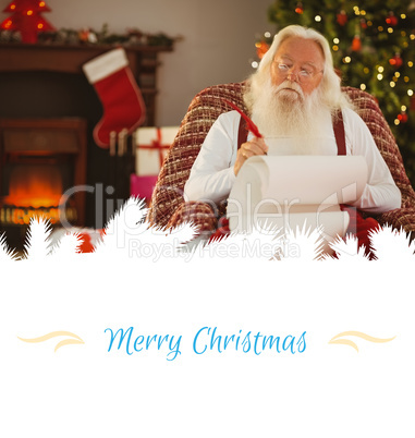 Composite image of relaxed santa writing list with a quill