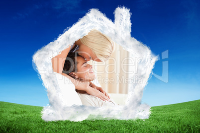 Composite image of woman kissing her fiance on the forehead
