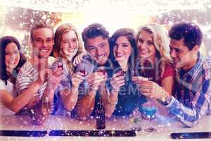 Composite image of friends with drinks