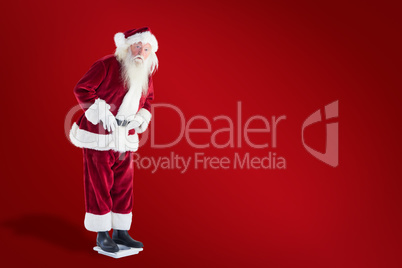 Composite image of santa is surprised about his weight