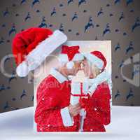 Composite image of festive couple