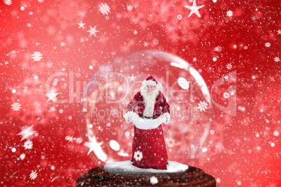 Composite image of santa holding open sack snow globe