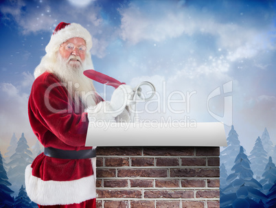 Composite image of santa writing his list