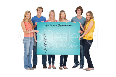 Composite image of a group of people holding blank sheet