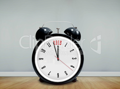 Composite image of 2015 in black alarm clock