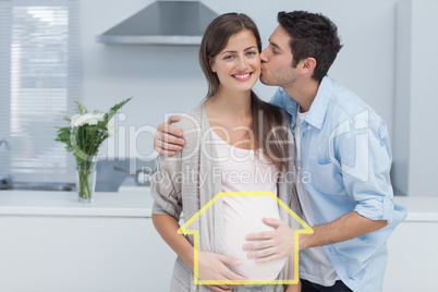 Composite image of man kissing his pregnant wife