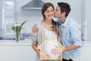 Composite image of man kissing his pregnant wife