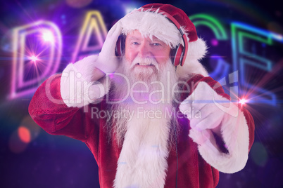 Composite image of santa is listening some music