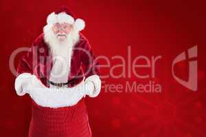 Composite image of santa open his red bag