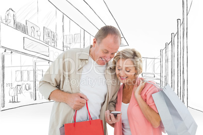 Composite image of couple with shopping bags and smartphone