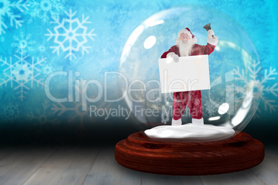 Santa ringing bell and holding sign in snow globe