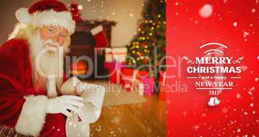 Composite image of smiling santa claus holding a scroll