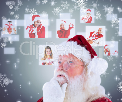 Composite image of santa is thinking about something