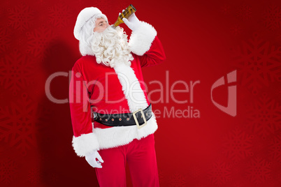 Composite image of father christmas drinking a beer