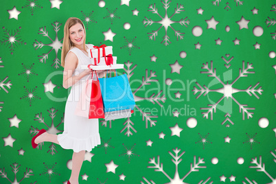 Composite image of pretty blonde with presents