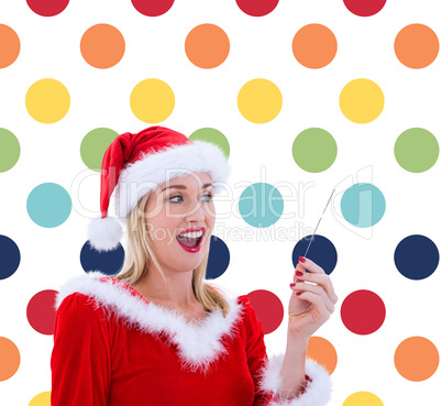 Composite image of festive blonde smiling at hand