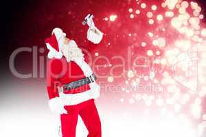 Composite image of happy santa claus singing with microphone