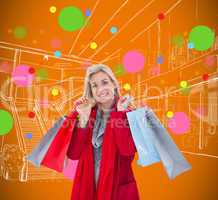 Composite image of blonde in winter clothes holding shopping bag