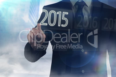 Composite image of businessman in suit pointing finger