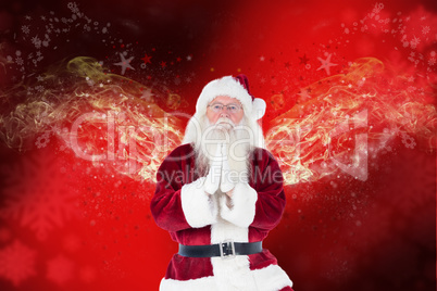 Composite image of father christmas doing some yoga