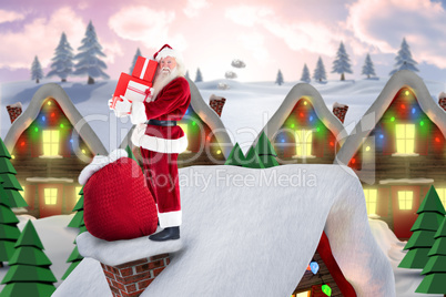 Composite image of santa on cottage roof