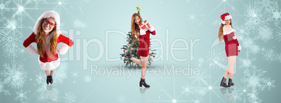 Composite image of festive redhead holding a gift