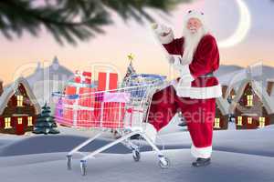 Composite image of santa delivering gifts from cart