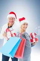 Couple with shopping bags and gifts