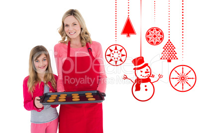 Composite image of mother and daughter with baking tray