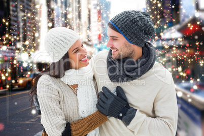 Composite image of young winter couple