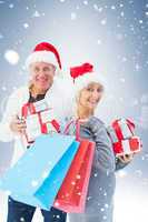 Couple with shopping bags and gifts