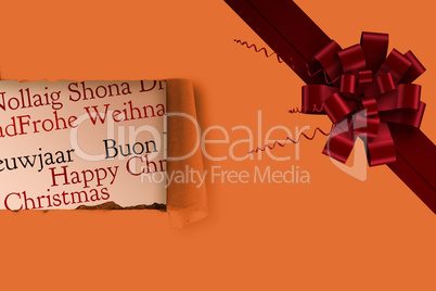 Composite image of red christmas bow and ribbon