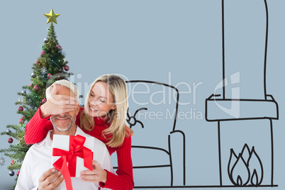 Composite image of loving couple with gift