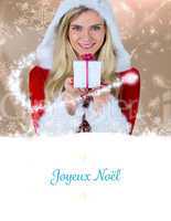 Composite image of pretty girl in santa outfit holding gift