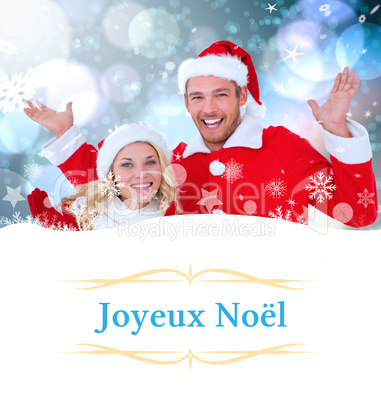 Composite image of young festive couple