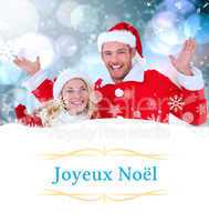 Composite image of young festive couple