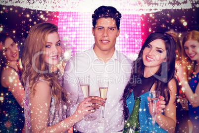 Composite image of friends drinking champagne