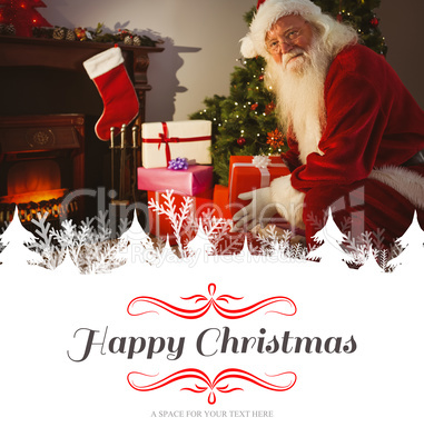 Composite image of smiling santa delivering gifts at christmas e