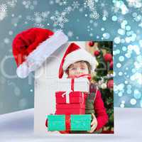 Composite image of cute festive little boy smiling at camera