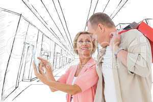 Composite image of couple with shopping bags and tablet