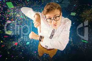 Composite image of geeky businessman pointing to watch