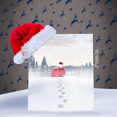 Composite image of santa delivery presents to village