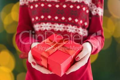 Composite image of close up of christmas present