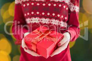 Composite image of close up of christmas present